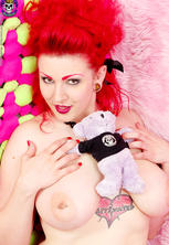 Busty tattooed punk redhead nude and plush