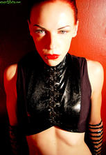 Pierced petite glamour slut black latex straps