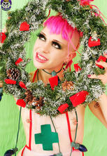 Tattooed pierced and shaved punk christmas babe