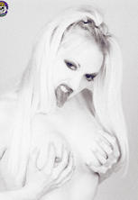 Ghostly blonde scream queen nude. 