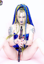 Very naughty punk girl plays with guns