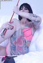 Tattooed domme with whip, leash high heels dildo
