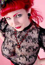 Stacked lascivious rubber red fetish girl with lace top