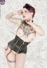 Hot purple hairy gothic tattoo pin-up babe nixon sixx in custom corset. 