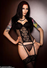Tiny gothic beauty in exciting stockings and lace