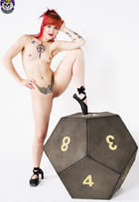 Leggy teen redhead with tattoos on huge dice