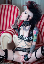 Gothic punk in fishnets beauty ready for monster dildo