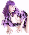 purple hair girl in striped stockings feather boa