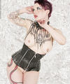 Hot purple haired Gothic tattoo pin-up babe Nixon Sixx in custom corset