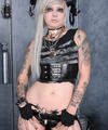 Tattooed Industrial Beauty in Boots and Leather