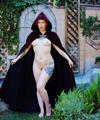 Magical pale redhead naked Cosplay in the garden